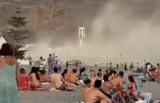 WATCH: Astonishing moment ‘mini hurricane’ sends beachgoers running for cover in Spain’s Costa Tropical